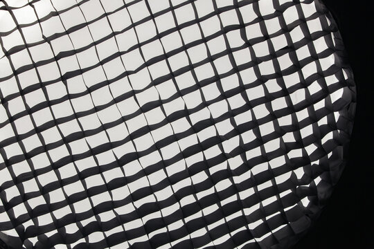 Abstract geometric background pattern of a photography studio softbox honeycomb grid.