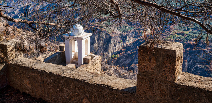 Panagia Katafigiotissa Chapel Framed by Burnt Branches in Zacholi, Greece