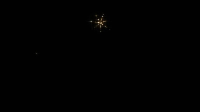 Magical holiday transition animation. Year 2026 dissolves into glowing golden dust and morphs into a sparkling 2027. Concept for Happy New Year celebration and passing of time.