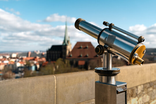 Erfurt, Germany - March 27, 2026. Telescope With Blurred Erfurt Cathedral View