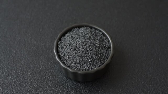 Black caviar from beluga or sturgeon, an expensive delicacy for sandwiches. Black caviar as a food background for your design