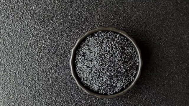 Black caviar from beluga or sturgeon, an expensive delicacy for sandwiches. Black caviar as a food background for your design