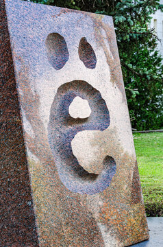 May 29, 2026. Russia, Ulyanovsk: A granite monument to the letter Ё with a carved silhouette of the letter on a city street