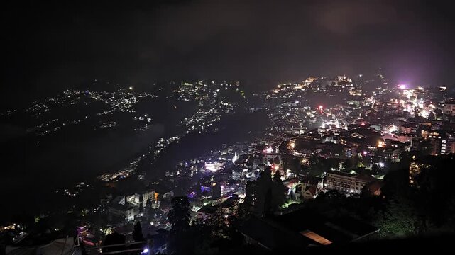 Night City Timelapse of Darjeeling &mdash; Hillside Town Lights, Illuminated Buildings, and Mountain Horizon Glow