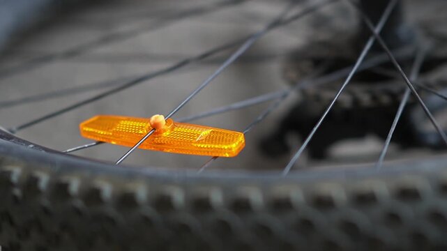 Bicycle wheel light reflector installation. Preparing your bike for the season. Updating parts, riding safety. Installing reflectors on wheels
