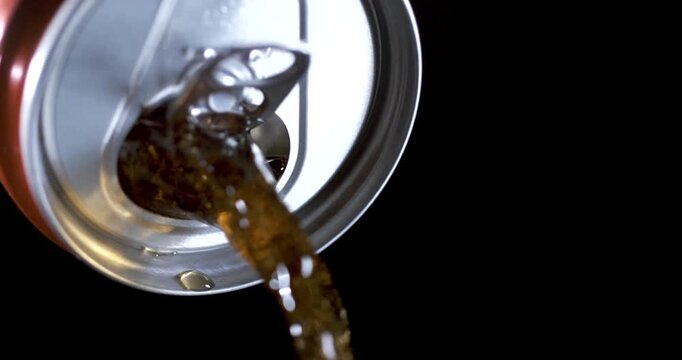 Pouring soda can captured in slow motion with detailed movement