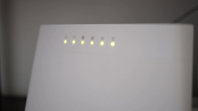 Modern WiFi router with active indicator lights showing stable internet connection essential technology for remote work online communication streaming and daily digital life
