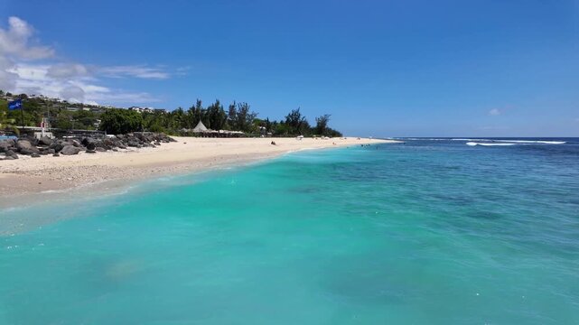 Scenic tropical footage landscape of Saint Gilles Les Bains beach, Reunion Island, Africa	