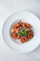 Fototapeta premium Crispy Coconut Shrimp with Tropical Slaw
