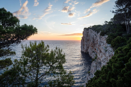 Stunning sunset over the majestic cliffs of Telascica Nature Park on Dugi Otok island, Croatia