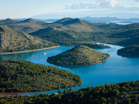 Aerial view of Skoljic island in the turquoise waters of Telascica bay, Dugi Otok, Croatia