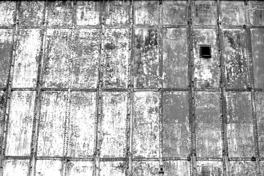 Old rusty hangar and silo
