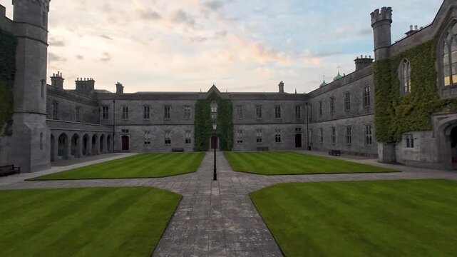 The University of Galway, quadrangle at cloudy sunset in Ireland, amazing architecture and landmark, medieval building