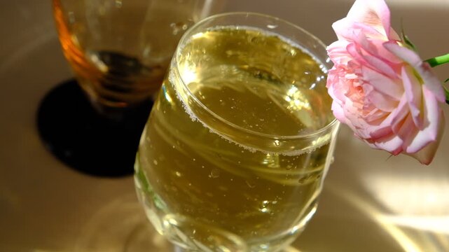 Flute of champagne, prosecco. Bubbles surge upward from the depths,  Each bubble catching the light like tiny, fleeting jewels. Rising, shining, popping &mdash; pure celebration in a glass. Happy Holidays!