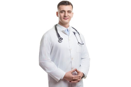 Portrait of Confident Professional Male GP Doctor Posing in Doctor's Smock With Endoscope and Hands Folded in Front on White As Medicine and Medical Treatment  Ideas.