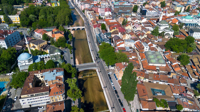 Aerial Drone View of Historic Miljacka River and Bascarsija Old Town in Sarajevo Bosnia