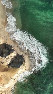Blanche Point, Port Willunga, South Australia at golden sunset: 4K Vertical Aerial Drone Footage of Coastal Red Cliffs, Ocean Waves, Maslin Beach, the Iconic Fleurieu Peninsula in South Adelaide