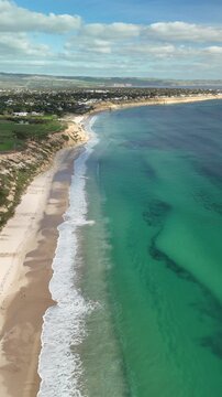 Port Willunga Beach, South Australia &ndash; 4K Vertical Aerial Drone Footage of Australia Beach, Limestone Cliffs, Golden Sand, Clear Blue Ocean Coastline, and Coastal Houses near Blanche Point
