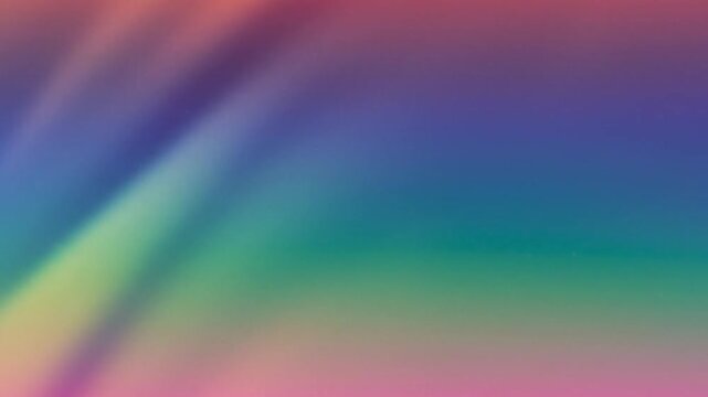 Gradient backdrop features diagonal bands of teal blue purple green yellow orange and pink
