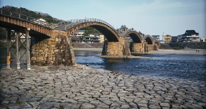 Kintai Bridge, Wooden Arches Over River Iwakuni In Japan - Tracking, Slow Motion Shot