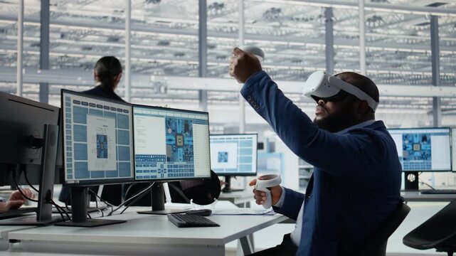Microchip factory lab specialist using VR headset to analyze chip architecture, African American employee programming circuits layout in office with virtual reality tech for semiconductor research.