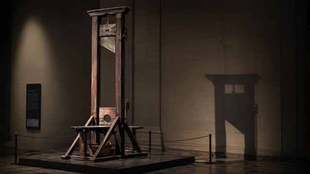 guillotine. A solitary historical guillotine displayed in a museum hall with dramatic lighting. event programs, museum guides, designed for cultural heritage projects and event programs.