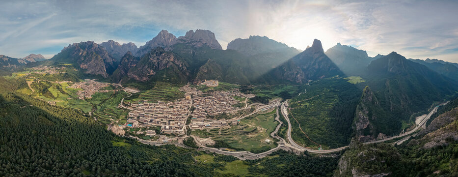 Panoramic scenery of Zhagana in Gannan Gansu, Tibetan village between green mountain valleys