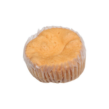 Single golden cupcake with slight indent in soft studio light for baking advertisement