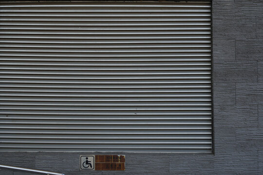 Close-up view of metal elevator with parallel lines