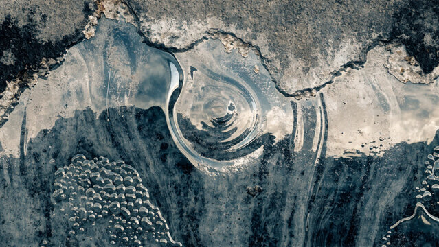 Abstract Swirling Patterns in Flowing Water Surface with Cracked Earth Texture