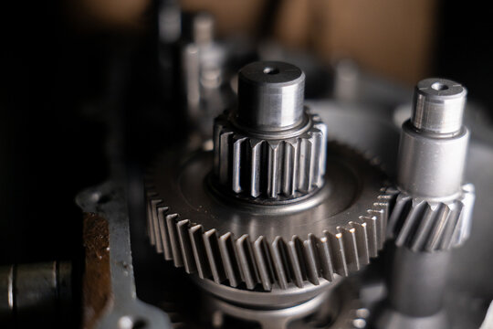 Close up gear metal machinery industrial mechanical engineering precision technology steel Close up of metal gear and machinery part showing industrial engineering precision and mechanical