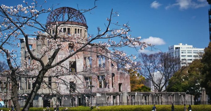 Hiroshima Peace Memorial Dome with Cherry Blossoms During Spring Season - Wide Shot