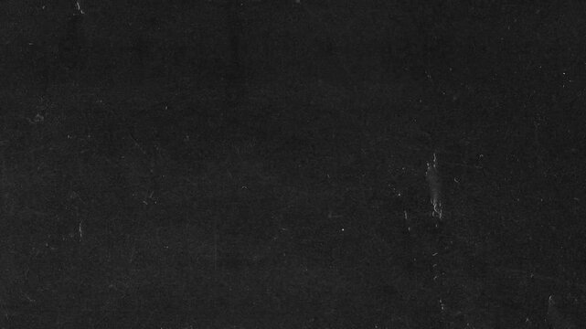 Grunge background texture with a dark matte background, grainy rough surface, noise particles, flat grey aesthetic. Suitable for website backgrounds and presentations.