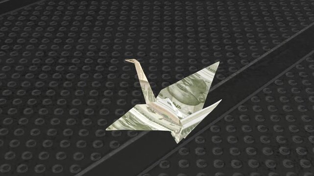 Beautiful origami crane bird intricately folded from a single Indian 500 Rupee currency note on a dark textured background.