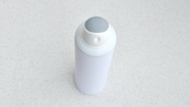 Clear image of spray deodorant, capturing its modern packaging and the refreshing sensation it offers.