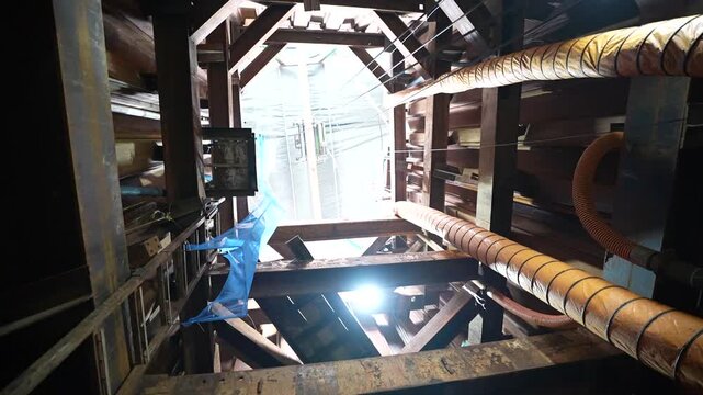 Various photos from highway tunnel construction The technician is overseeing the construction of the underground tunnel in the work shaft for maintenance of Water supply pipe. deep drainage tunnel sha
