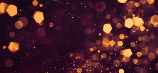 Elegant dark purple background with golden bokeh perfect for luxurious holiday greetings and magical celebration designs © susral