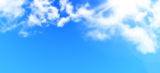 Soft white clouds and bright sun in clear blue sky perfect for peaceful natural environments and optimistic concept designs