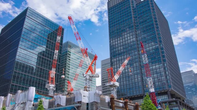 A timelapse of moving crane at the underconsumption in the business town wide shot
