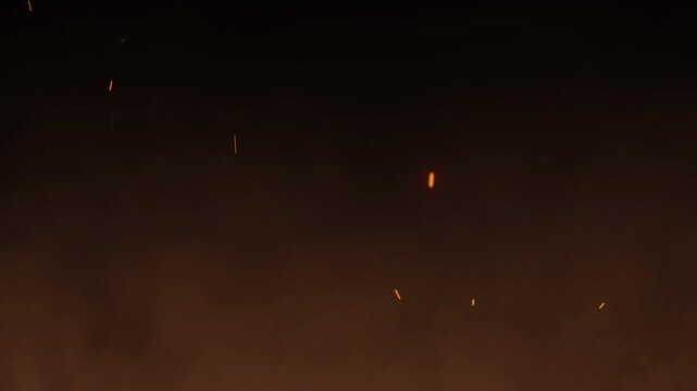 Orange smoke cloud fire sparks cinematic atmospheric background featuring glowing embers and misty fog for dramatic video effects.