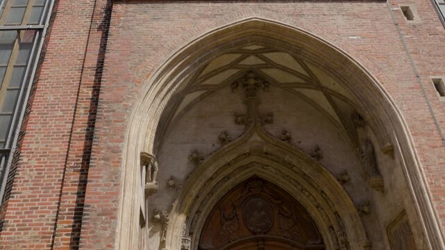 Munich Gothic Church Brick Facade With Arched Entrance Detail
