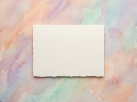 Blank White Card with Deckle Edges on Pastel Watercolor Background