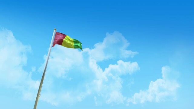 Guinea Flag 3D Render Animation on Pole with Blue Sky and Clouds - Low Angle View