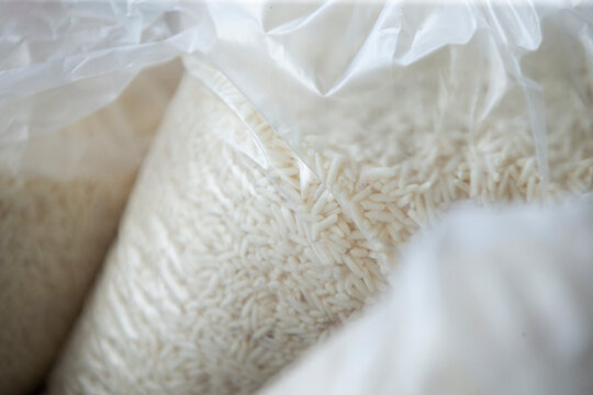 Rice in a plastic bag. Close-up. Selective focus.