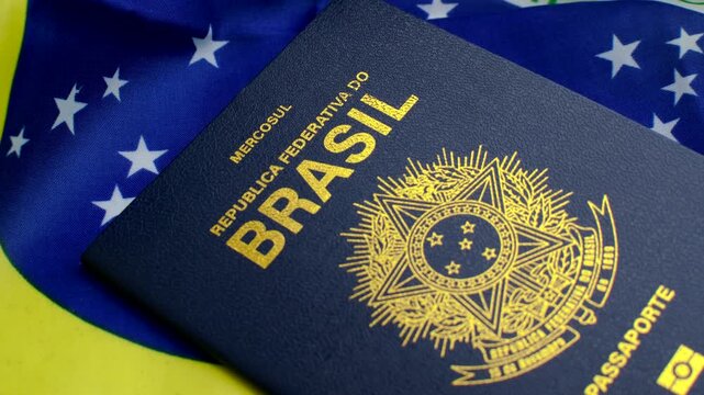 Brazilian Passport on the Flag: A symbol of national identity, the passport rests upon the vibrant flag of Brazil, evoking citizenship and pride.