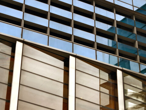 Glass building pattern. Exterior view of modern glass structure with geometric design