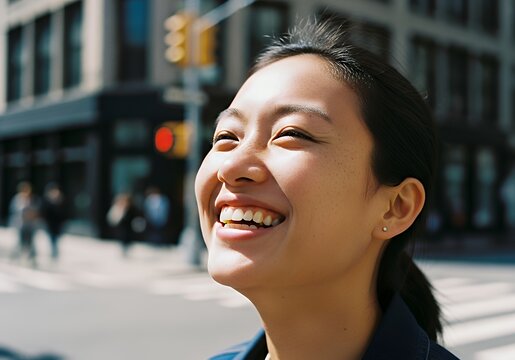 This is an image showing a close up of a woman smiling