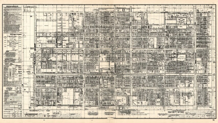 Obraz premium Vintage city map blueprint detailed plan with streets buildings and blocks in sepia tones