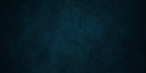 Dark texture chalk board and grunge black board blue overlay background. Dark charcoal grunge wall texture background. Dark black rough grunge surface with smoke edge.  © MDFAIMIDULISLAM