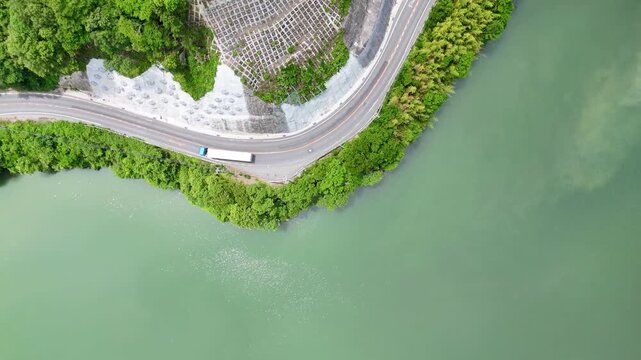 Aerial view of road and lake side green mountain in Japan, beautiful landscape